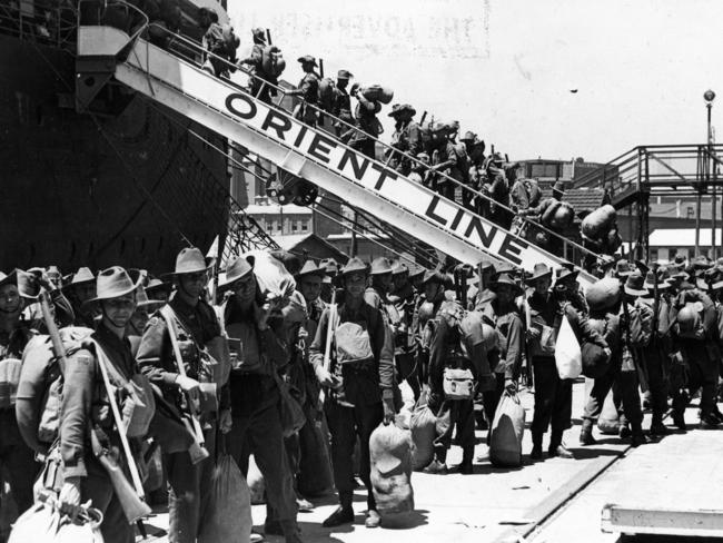 Australian soldiers leave Sydney for service abroad at Darling Harbour February 10, 1940. Picture: The Sun/Associated Newspapers Ltd