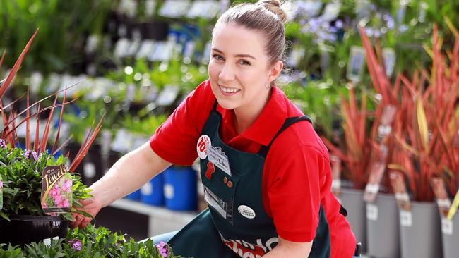 Bunnings team member Courtney Simmons pose for photographs in the nursery of the new Bunnings. (AAP IMAGE / Angelo Velardo)