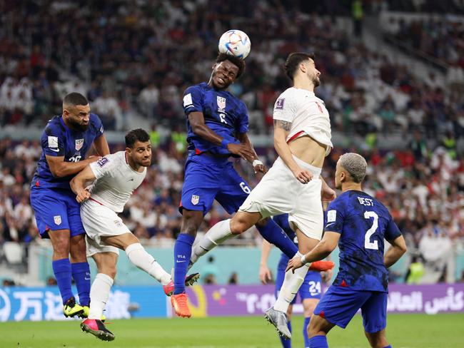 Yunus Musah of United States heads the ball against Saeid Ezatolahi of IR Iran. Picture: Dean Mouhtaropoulos/Getty Images