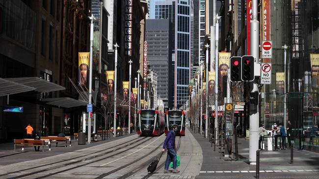 Sydney’s CBD during the city’s grim, prolonged lockdown, one scene that is driving the regional move. Picture: NCA NewsWire / Damian Shaw