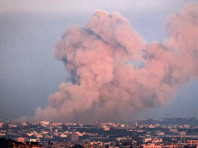 A picture taken from Rafah shows smoke billowing over Khan Yunis in the southern Gaza Strip during Israeli bombardment on January 3, 2024, amid ongoing battles between Israel and the Hamas movement. (Photo by AFP)