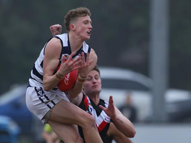 Pearcedale's Kaolan Thornton takes a mark. Picture: Doug Farr