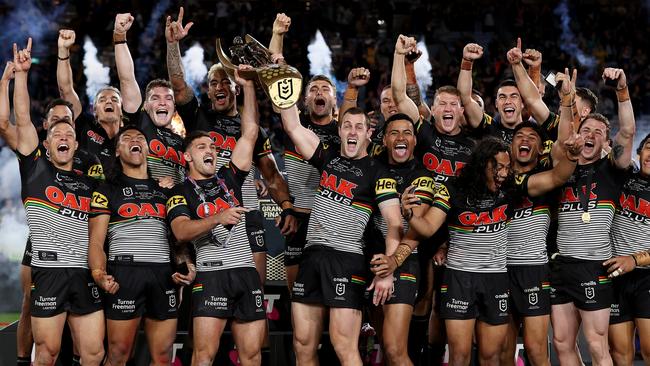 The Panthers celebrate with the NRL Premiership Trophy after victory in the 2022 NRL Grand Final match between the Penrith Panthers and the Parramatta Eels at Accor Stadium on October 02, 2022, in Sydney, Australia. (Photo by Cameron Spencer/Getty Images)