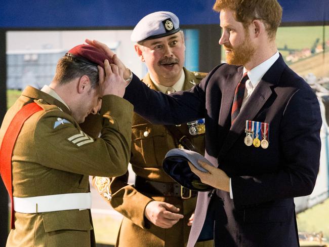 Prince Harry attended a ceremony for graduate pilots at the Museum of Army Flying in London on March 16. Picture: AFP/Heathcliff O'Malley