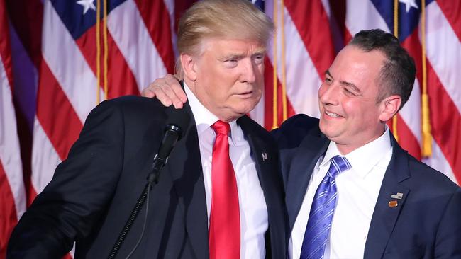 Donald Trump and Reince Priebus, chairman of the Republican National Committee, embrace during his election night celebrations. Picture: Mark Wilson/Getty Images.