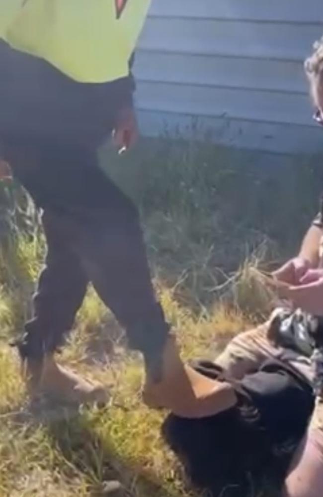 The man’s boot is pressed hard into the child’s head during the citizens arrest.