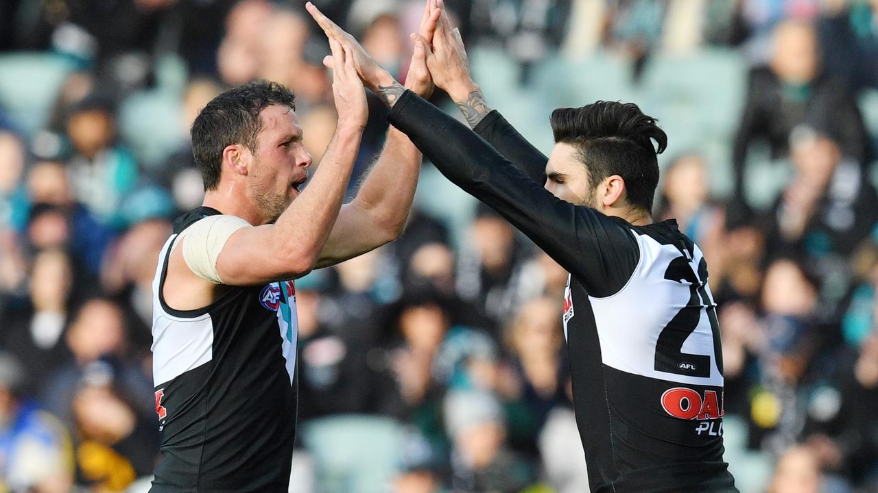 Wingard celebrates a goal with former Power teammate Travis Boak. Picture: AAP