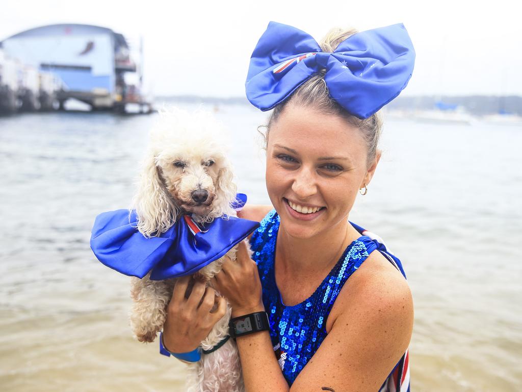 Australia Day stand up paddle board races at Watsons Bay. Ashley Corbett pictured with pup, Muffin. Picture: Dylan Robinson