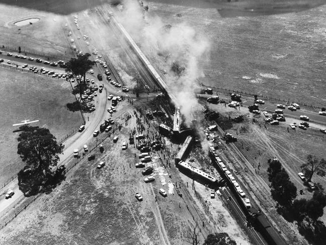 Carriages lay where they were jolted from their tracks in the high-speed impact.