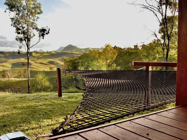 Soak in the view from the infinity hammock at Baya Tiny House Eco Retreat