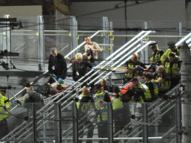 Casualties being carried out of the Manchester Arena on barriers after an explosion at the Ariana Grande concert. Picture: icelebtv