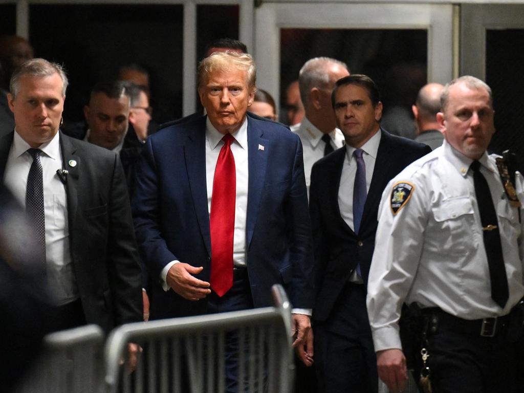 Former US President Donald Trump arrives to speak to the press at Manhattan Criminal Court after a hearing in his case of paying hush money to cover up extramarital affairs. Picture: AFP