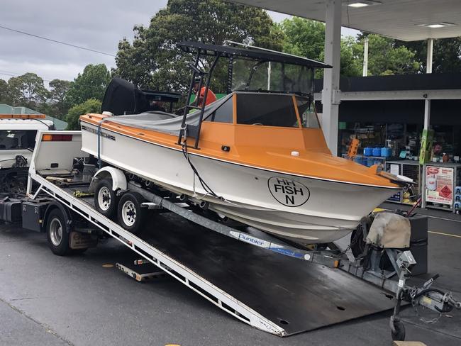 A boat and trailer, being towed by a ute, were involved in the three-car crash. Picture: Jim O’Rourke