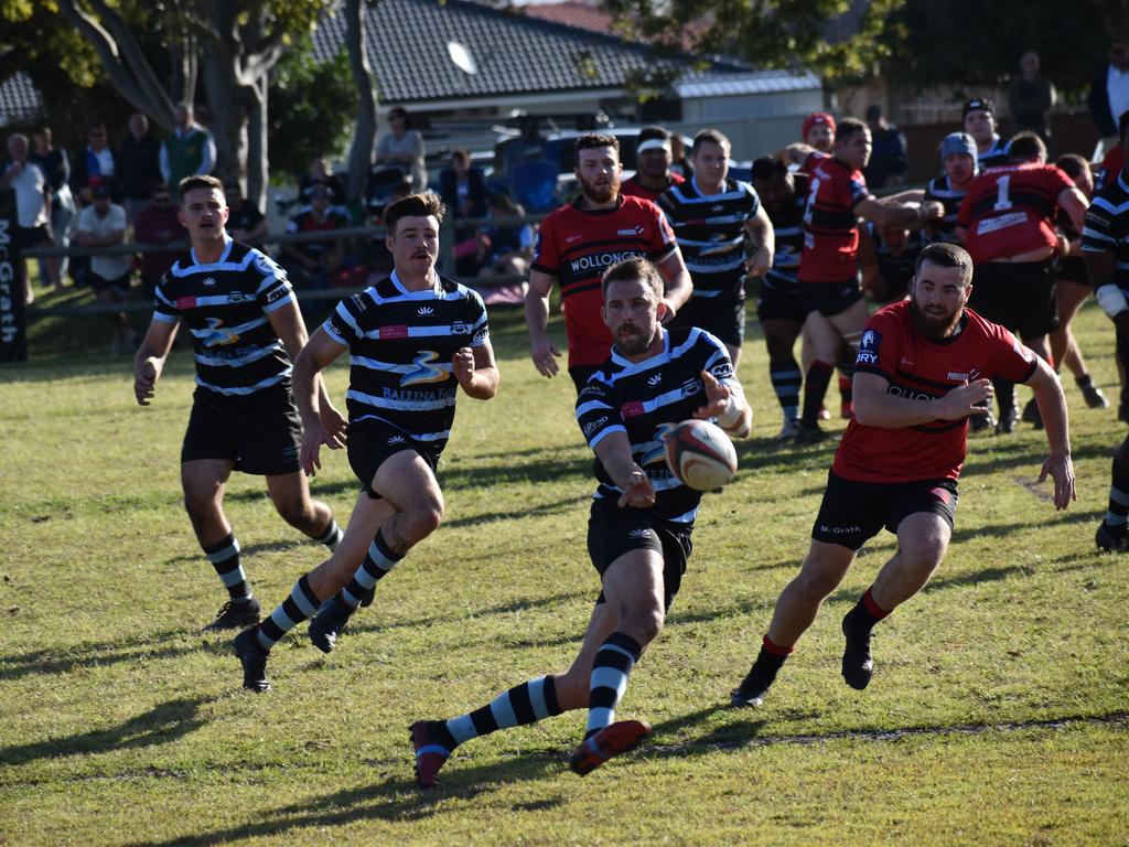 Ballina move the play wide following a scrum