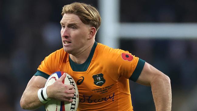 LONDON, ENGLAND - NOVEMBER 09:   Tate McDermott of Australia runs with the ball during the Autumn Nations Series 2025 match between England and Australia at Allianz Twickenham Stadium on November 09, 2024 in London, England. (Photo by David Rogers/Getty Images)