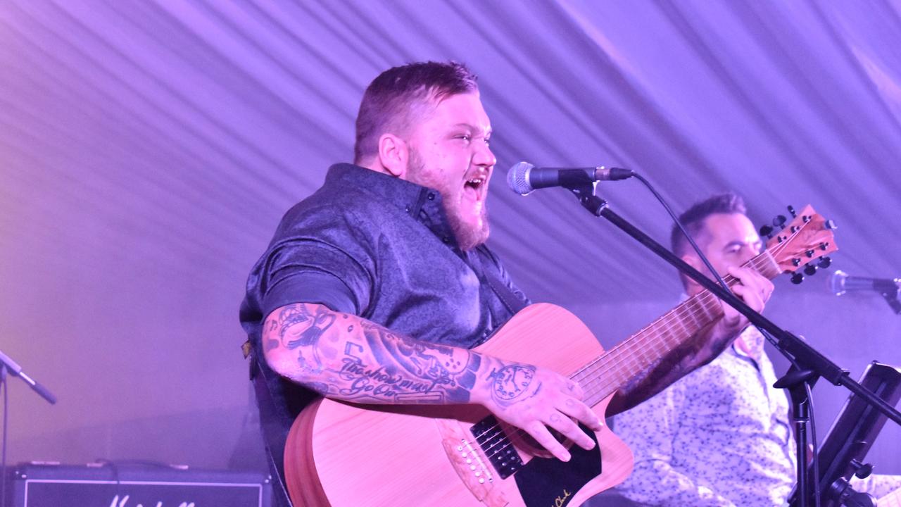 Live music from Tamworth's Jarred Taylor Band kept the crowd moving on a chilly evening in Proserpine. Picture Kirra Grimes.