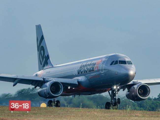 A Jetstar aircraft lands at Darwin airport Picture: Glenn Campbell