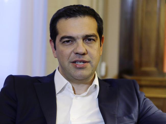 Tune changed ... Greece's Prime Minister Alexis Tsipras is fighting to stay in the Euro. Picture: AP/Thanassis Stavrakis