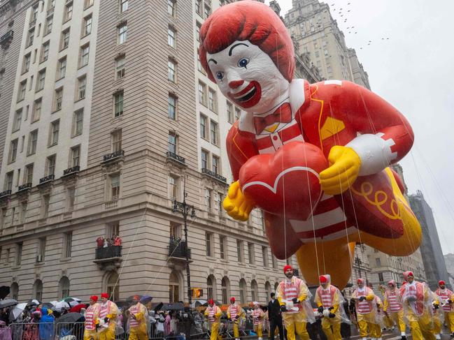 The Ronald McDonald balloon floats down the street during the annual Macy's Thanksgiving Day Parade in New York City. Picture: AFP