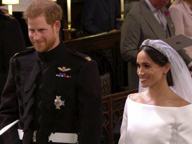 Prince Harry and Meghan Markle stand during their wedding ceremony at St. George's Chapel in Windsor Castle. Picture: UK Pool/Sky News via AP