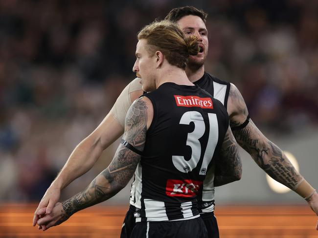 Jack Crisp and Beau McCreery celebrate a Magpies goal. Picture: Daniel Pockett/Getty Images