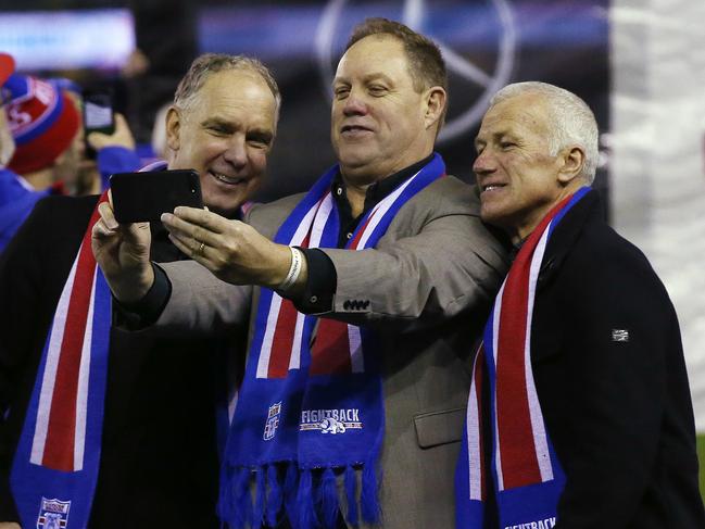 Bulldogs greats Steve Wallis, Rick Kennedy and Brian Royal take a photo after being honoured in 2019 pre -game. Picture: Michael Klein