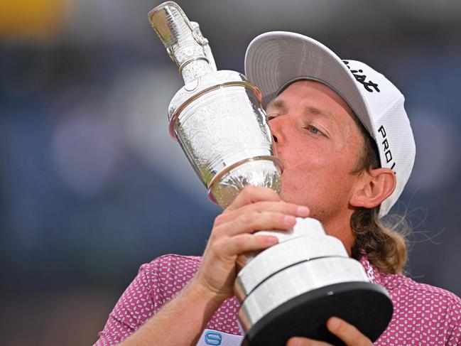 Cam Smith with the British Open trophy he won in 2022. Picture: Glyn Kirk / AFP