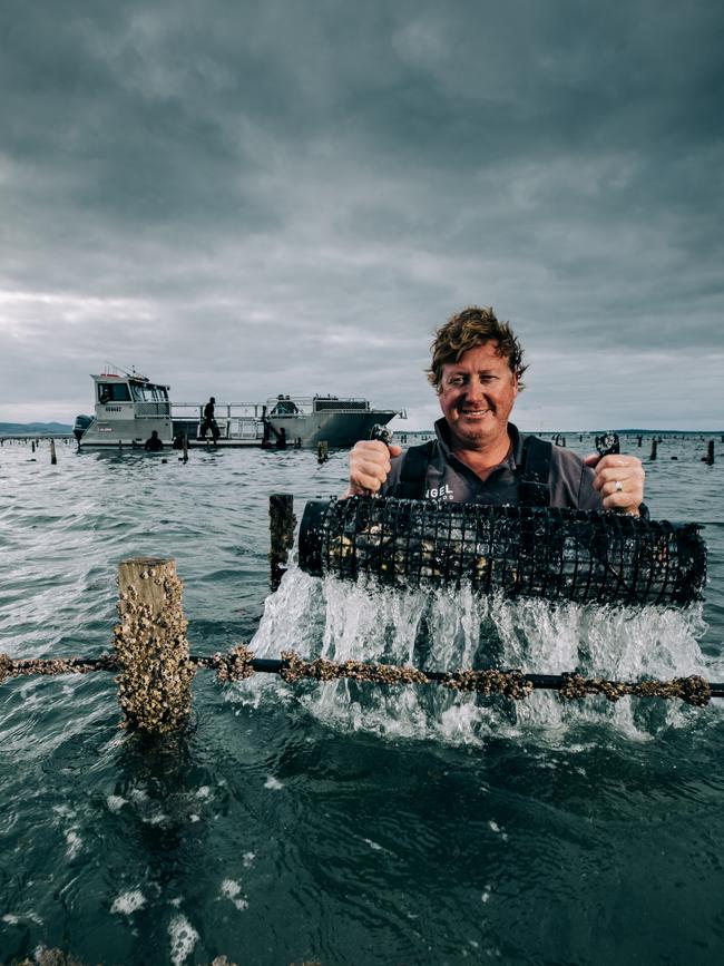 10/05/2021 Company founder and CEO of Angel Seafood Zac Halman checking stock at Coffin Bay. Robert Lang