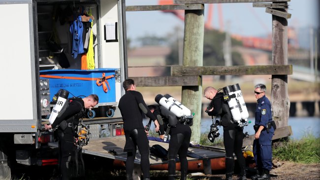 NSW Police divers were brought in to assist in the underwater search. Picture: Peter Lorimer