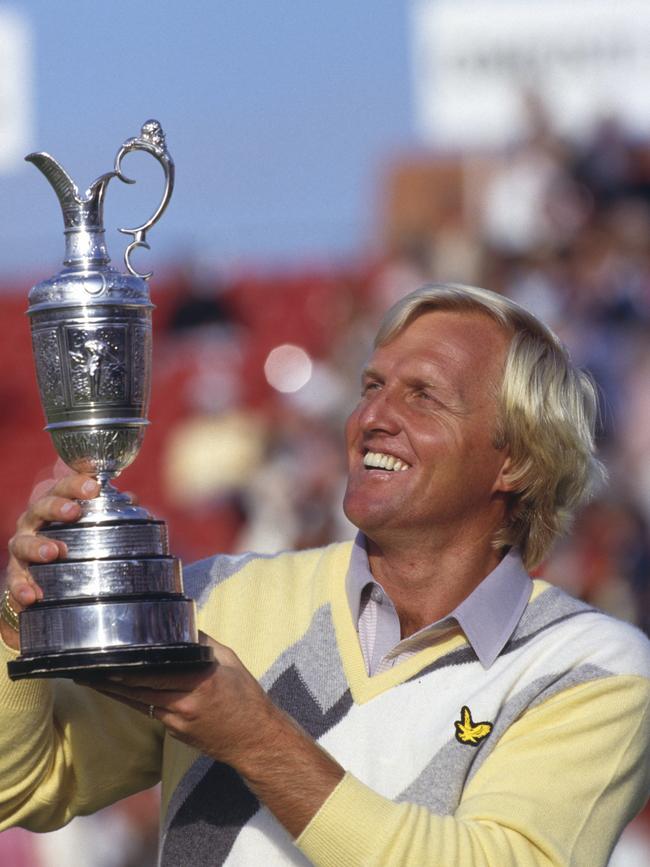 Greg Norman of Australia holds the Claret Jug in 1986