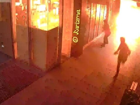 CCTV of the moment the Docklands restaurant owned by Fadi Haddara went up in flames. Picture: Victoria Police