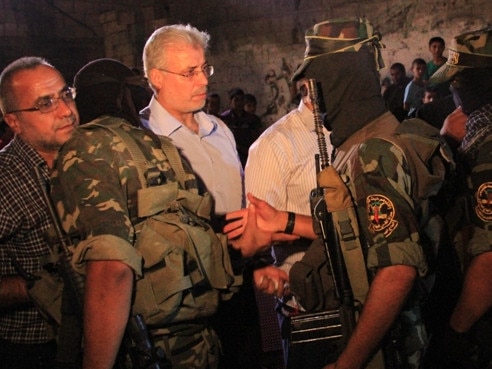 Caption: In 2012, Palestinian Islamic Jihad organised a memorial ceremony for Remah Al-Hasani, Fayez Elhasani's son. At this ceremony, Mr Elhasani can be seen shaking hands with members of PIJ. Picture: Supplied/ source https://paltoday.ps/ar/post/146812/%D8%A8%D8%A7%D9%84%D8%B5%D9%88%D8%B1-%D8%A7%D9%84%D8%AC%D9%87%D8%A7%D8%AF-%D9%8A%D9%86%D8%B8%D9%85-%D8%AD%D9%81%D9%84%D8%A7-%D8%AA%D8%A3%D8%A8%D9%8A%D9%86%D9%8A