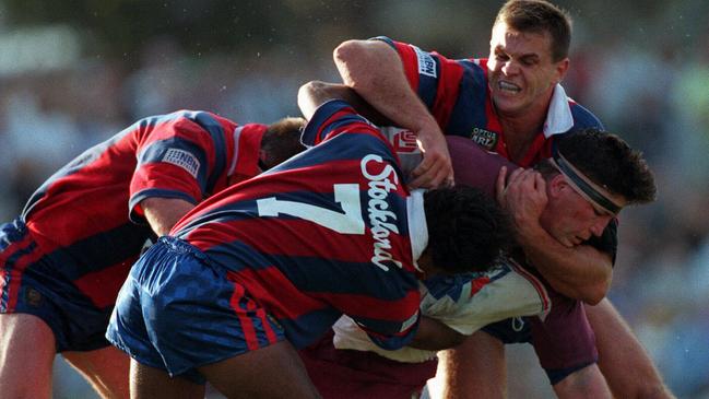 Paul Harragon gets a firm grip of Mark Carroll’s head during an early season clash between Newcastle and Manly in 1997.