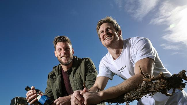 Poets and they didn’t know it — Port Adelaide players Brad Ebert and Tom Jonas launched their wine label this week. They are at the National Wine Centre. Picture Sarah Reed