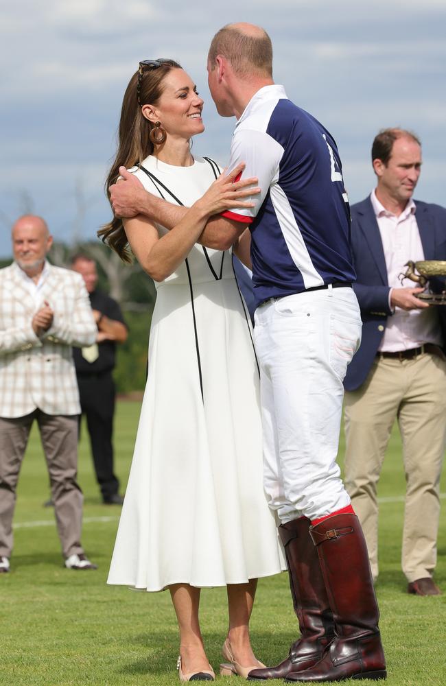 Prince William, Duke of Cambridge and Catherine, Duchess of Cambridge embrace after the Royal Charity Polo Cup 2022 at Guards Polo Club. Picture: Chris Jackson/Getty Images for TLA Worldwide