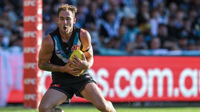 ADELAIDE, AUSTRALIA - MARCH 17:  Jeremy Finlayson of the Power marks during the round one AFL match between Port Adelaide Power and West Coast Eagles at Adelaide Oval, on March 17, 2024, in Adelaide, Australia. (Photo by Mark Brake/Getty Images)