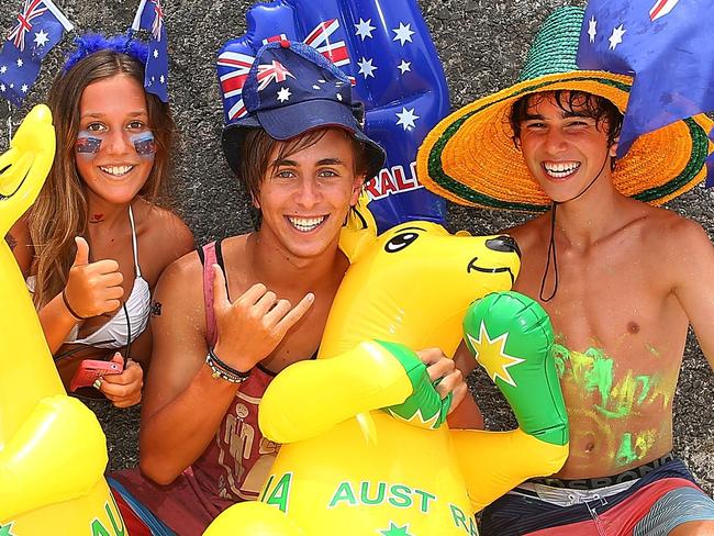 SYDNEY, AUSTRALIA - JANUARY 26: Beachgoers pose on Bondi beach as part of the 2013 Australia Day Celebrations on January 26, 2013 in Sydney, Australia. Australia Day, formerly known as Foundation Day, is the official national day of Australia and is celebrated annually on January 26 to commemorate the arrival of the First Fleet to Sydney in 1788. (Photo by Brendon Thorne/Getty Images)