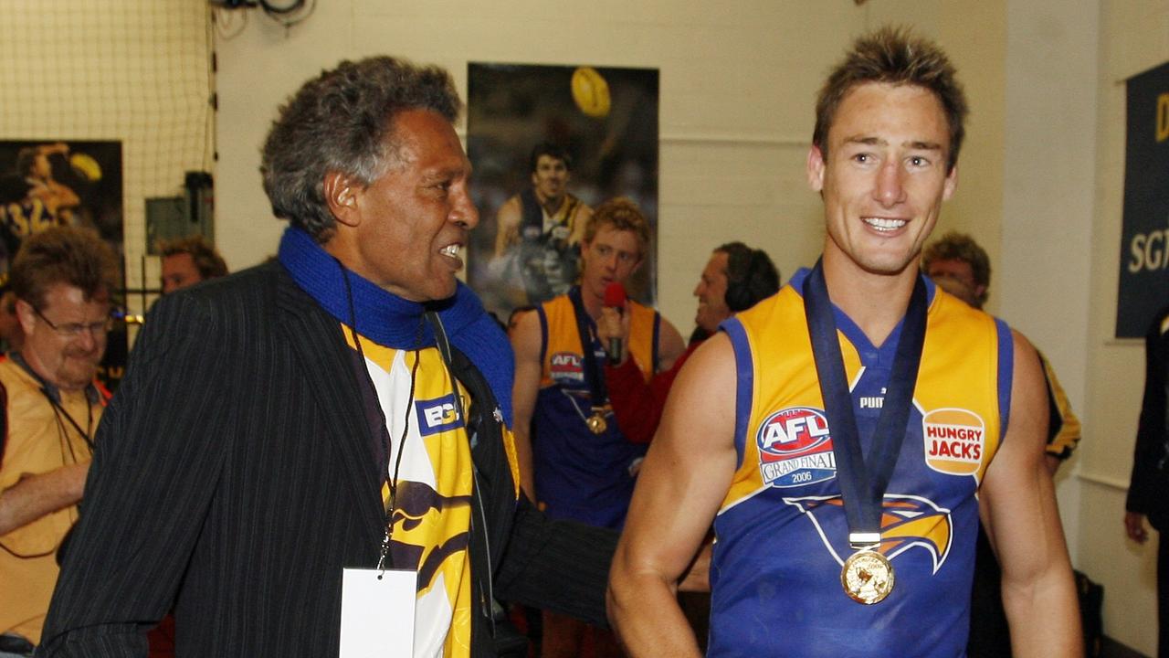 A pumped up Ernie Dingo with Adam Hunter after the 2006 AFL Grand Final. Picture: Michael Dodge/News Corp Australia