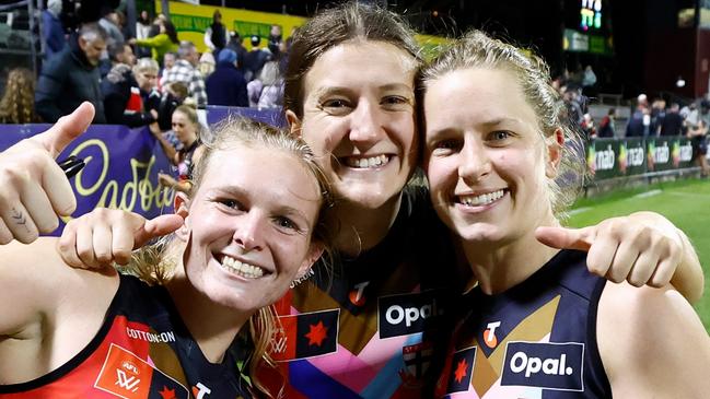 MELBOURNE, AUSTRALIA - OCTOBER 08: Serene Watson, Tyanna Smith and Jaimee Lambert of the Saints celebrate during the 2024 AFLW Round 07 match between the St Kilda Saints and the Greater Western Sydney Giants at Kinetic Stadium on October 08, 2024 in Melbourne, Australia. (Photo by Michael Willson/AFL Photos via Getty Images)