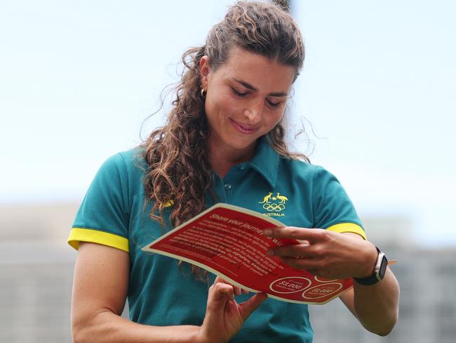 Jessica Fox checks out her ticket to Paris. Picture: Mike Owen/Getty Images