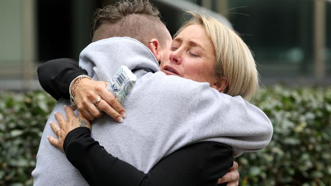 Denise Chase, the mother of Mitchell Chase, is comforted by family and friends outside court after the sentencing. Picture: AAP/Richard Wainwright