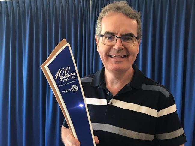 Grafton Midday Rotary secretary Greg Butcher with the baton that will be used for the 100 Years of Rotary Relay starting in Grafton this Saturday and arriving at Tweed Heads 100 days later.