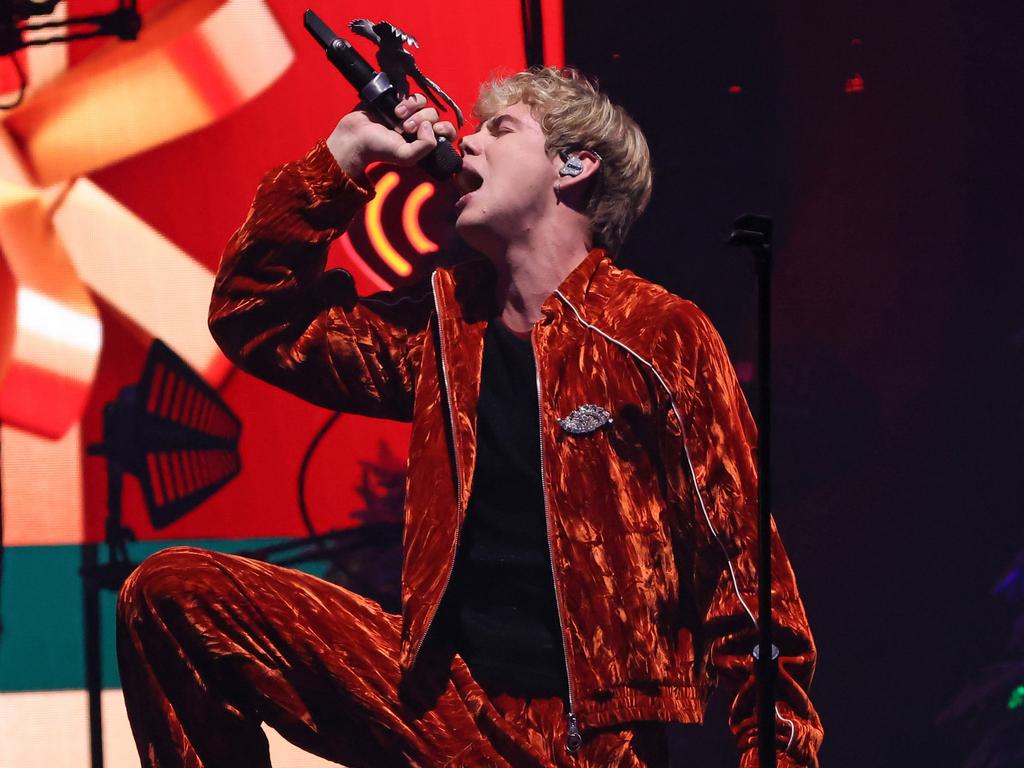 The 21-year-old donned a festive rust-toned tracksuit. Picture: Mike Coppola/Getty Images