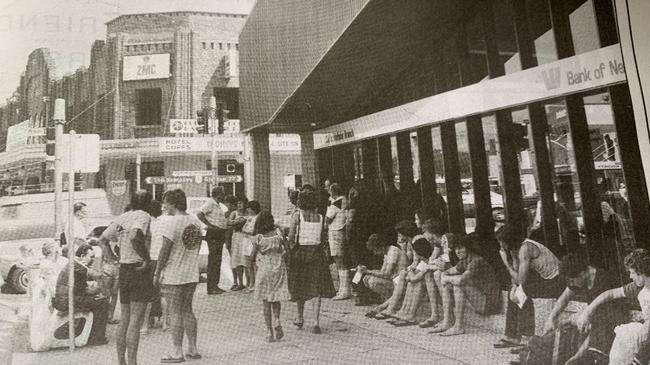 Many readers guessed it was the early 80s. It was 1983 and people were lined up waiting for the bank to open.