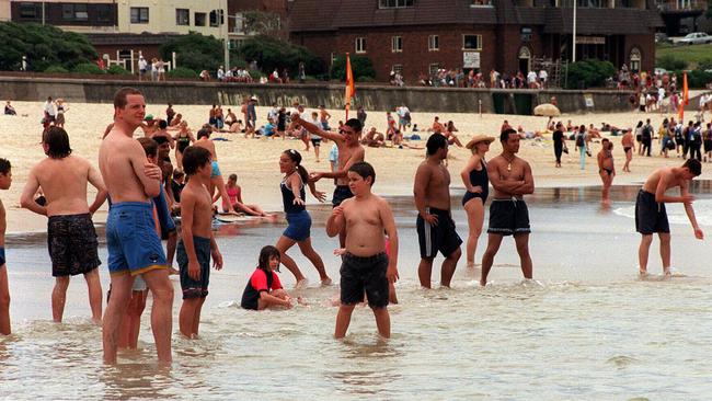 Swimmers wait for the all-clear after the sighting of bronze whaler forced the closure of Bondi in 1998.