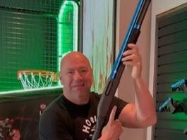 UFC boss Dana White in the laser gun room in his hotel suite.