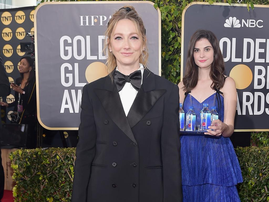 Judy Greer … and the Fiji Water girl. Picture: Stefanie Keenan/Getty Images for FIJI Water