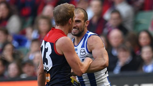Ben Cunnington gets up close with Bernie Vince. Picture: AAP