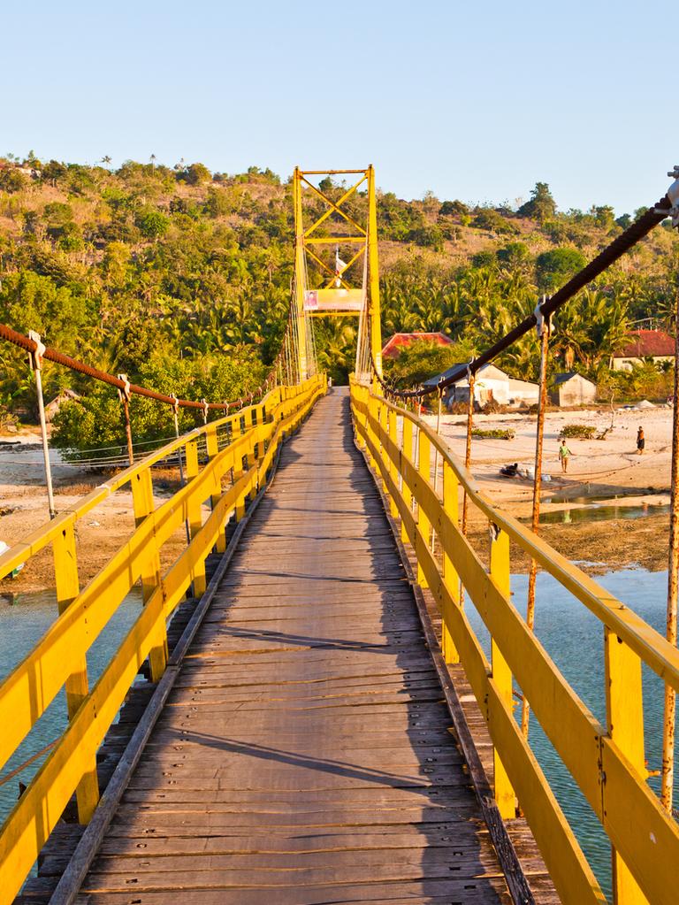 Yellow Bridge connects Nusa Lembongan to Nusa Ceningan and is a thrilling and tactical scooter ride across.