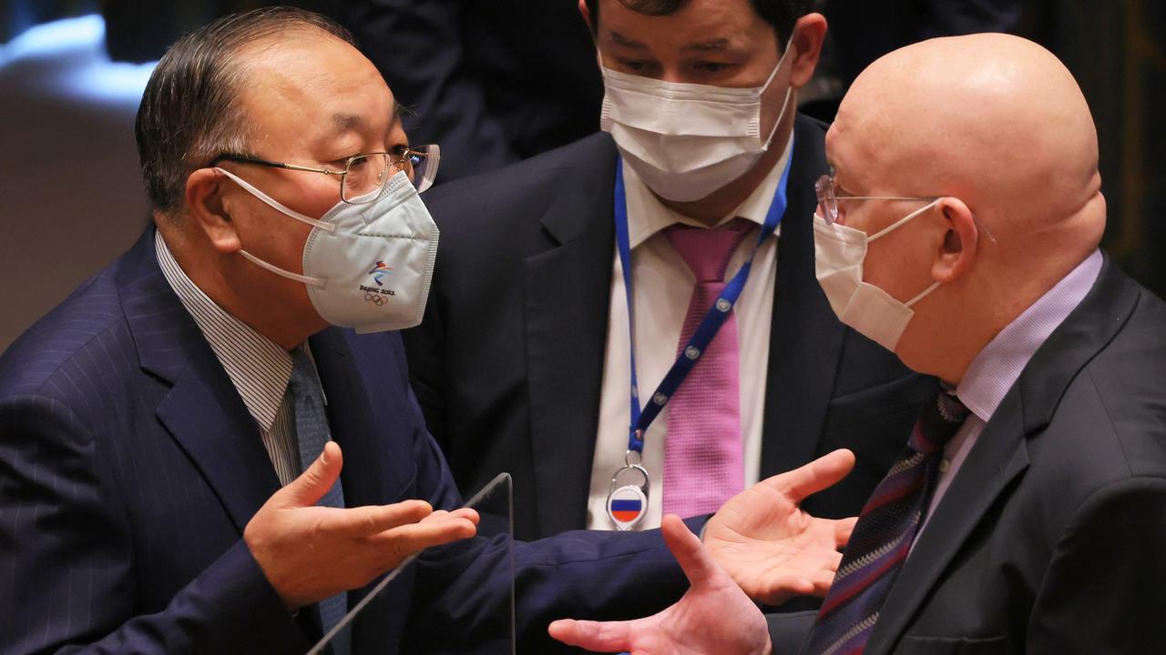 Zhang Jun, Permanent Representative of China, and Ambassador Vasily Nebenzia, Permanent Representative of the Russian Federation, speak before the start of a meeting to discuss the humanitarian crisis in Ukraine at the United Nations headquarters. Picture: Michael M. Santiago/Getty Images/AFP